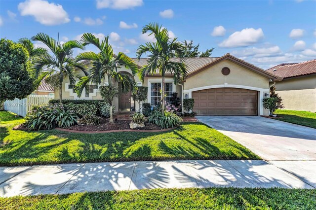 view of front of home with a garage