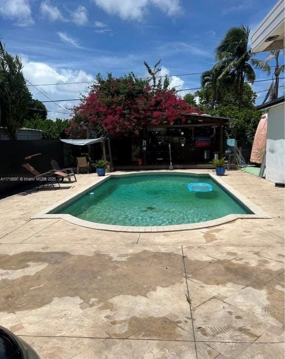 view of pool with a patio