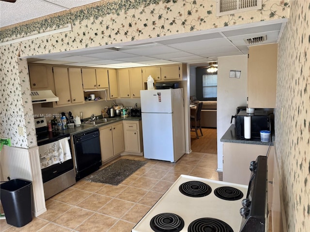 kitchen with stove, stainless steel electric stove, sink, dishwasher, and white fridge