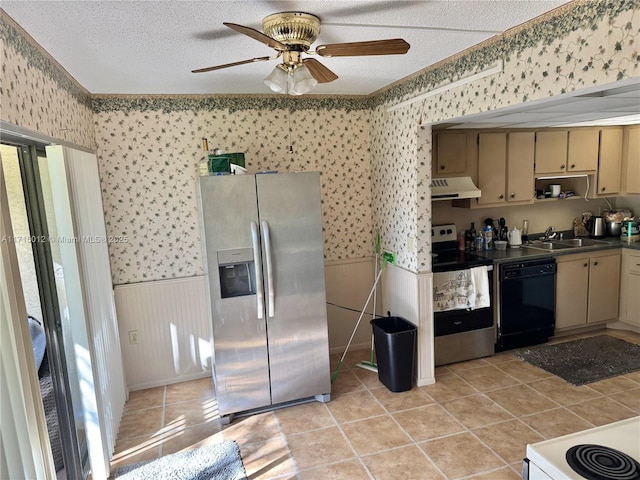 kitchen featuring stainless steel appliances, ceiling fan, sink, cream cabinets, and light tile patterned floors