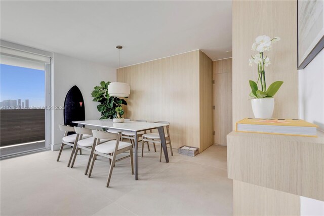 dining room with a wall of windows