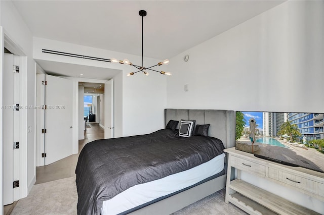 bedroom with an inviting chandelier