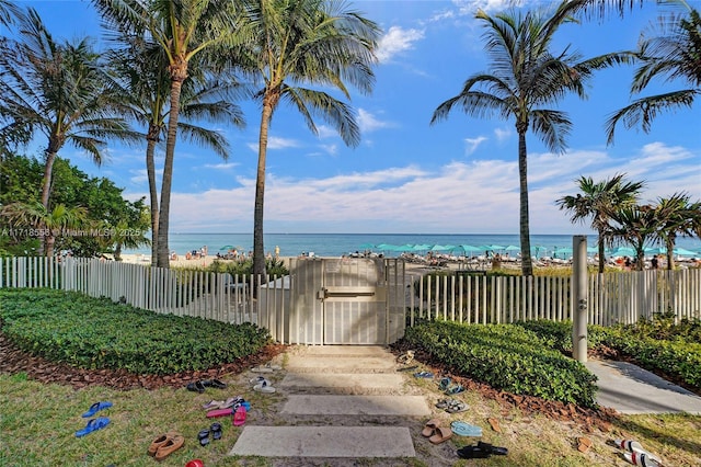 property view of water featuring a beach view