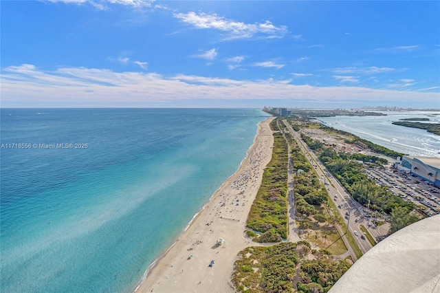 aerial view with a beach view and a water view