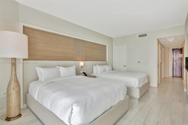 bedroom featuring light hardwood / wood-style floors