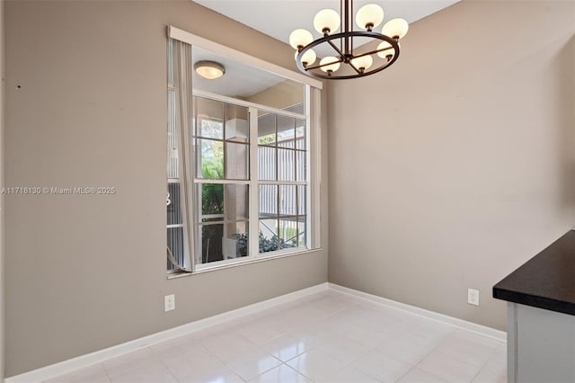 unfurnished dining area featuring light tile patterned flooring and an inviting chandelier