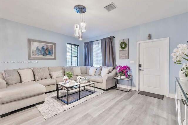 living room featuring light wood-type flooring