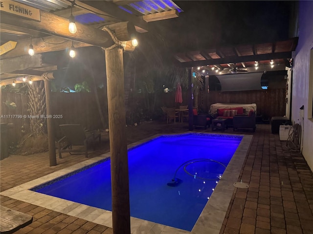 view of pool with an outdoor living space, a pergola, and a patio