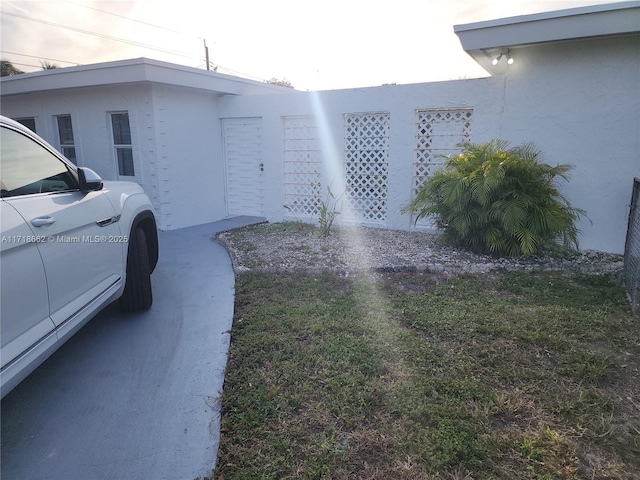 view of home's exterior with a yard