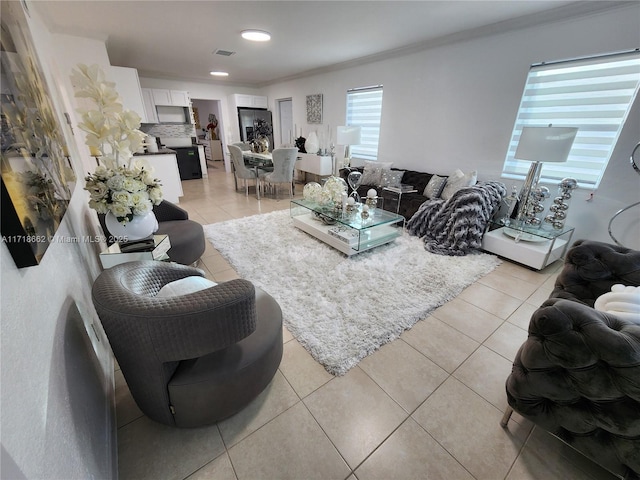 tiled living room with crown molding