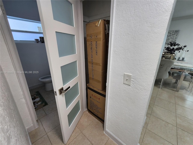 bathroom featuring tile patterned flooring