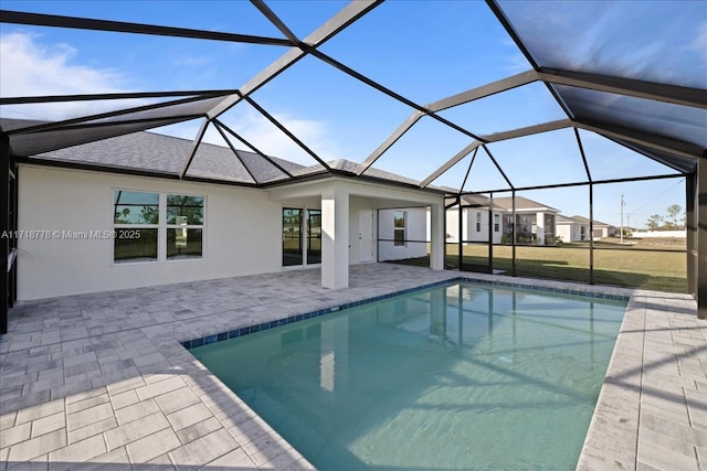 view of pool featuring a lanai and a patio