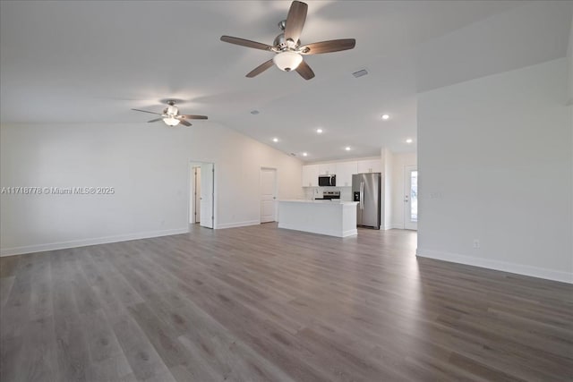 unfurnished living room featuring ceiling fan, lofted ceiling, and hardwood / wood-style flooring