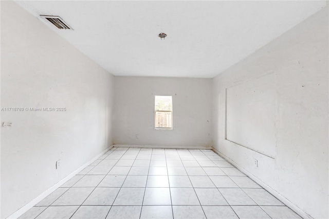 view of tiled spare room