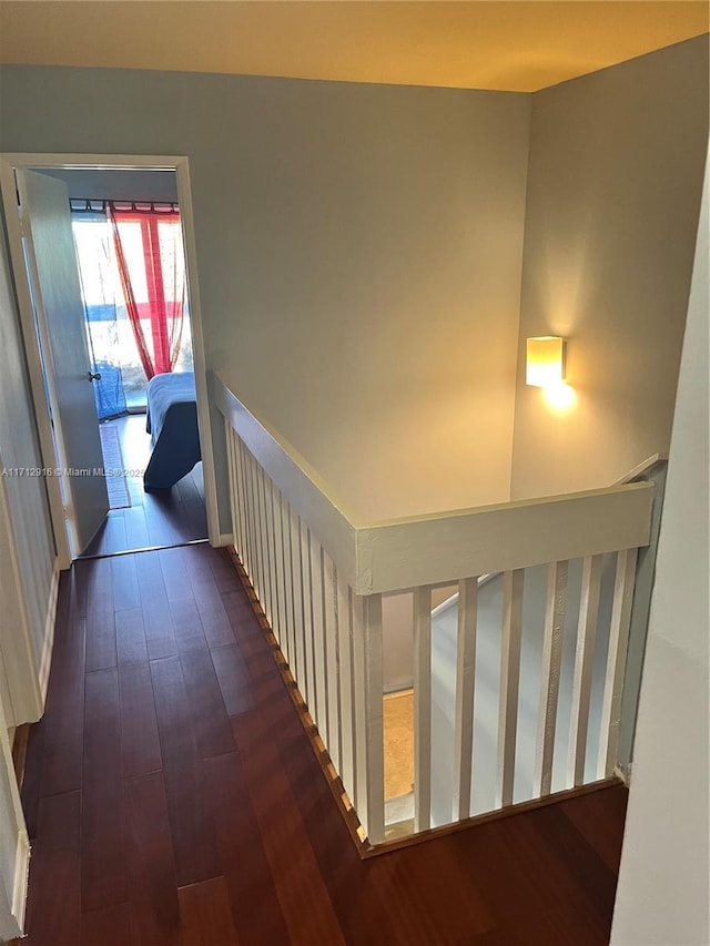 hall with dark hardwood / wood-style floors