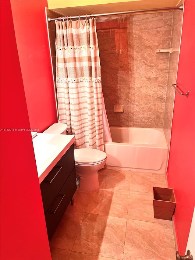 full bathroom with shower / tub combo with curtain, vanity, and toilet