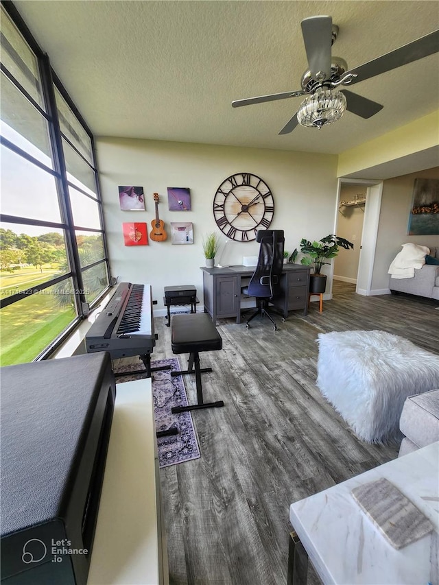 living room with a textured ceiling and hardwood / wood-style flooring