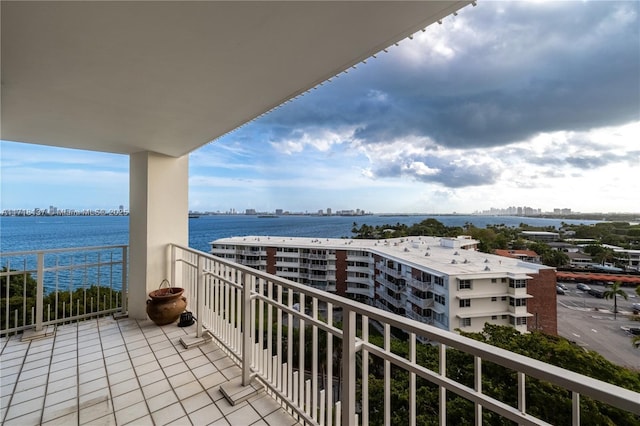 balcony featuring a water view