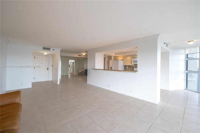 4000 Towerside Ter Unit 908, Miami, FL 33138 - unfurnished living room featuring ornamental molding and light tile patterned floors
