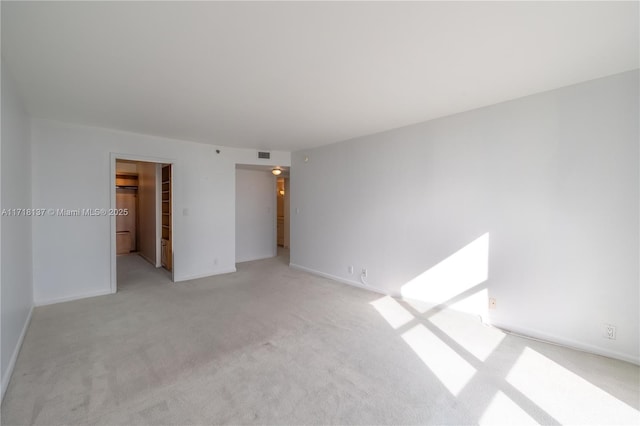 4000 Towerside Ter Unit 908, Miami, FL 33138 - empty room with light colored carpet and baseboards