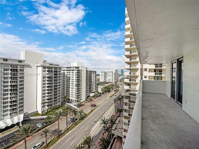 balcony featuring a city view
