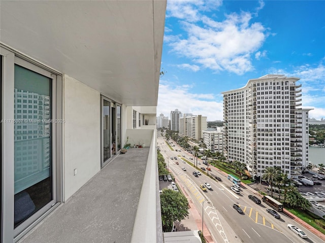 balcony featuring a view of city