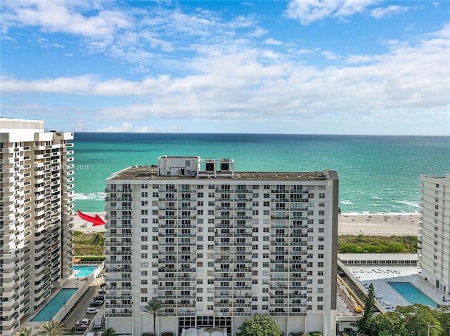 bird's eye view with a water view