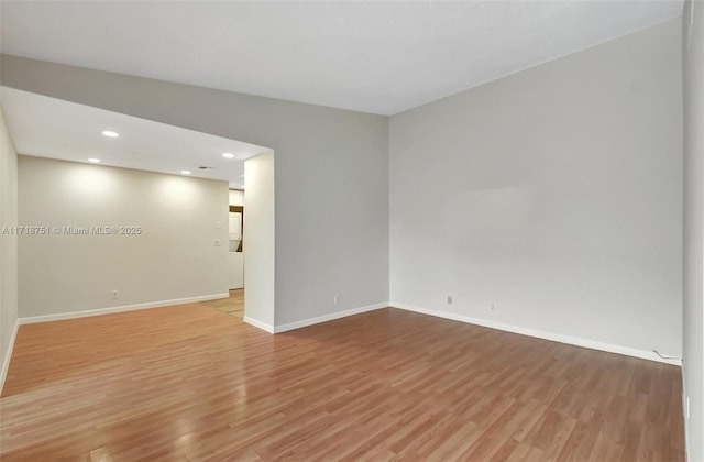 unfurnished room featuring light wood-type flooring