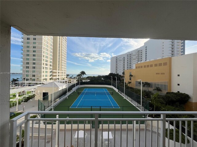 770 Claughton Island Dr Unit 606, Miami, FL 33131 - view of tennis court with a city view and a water view