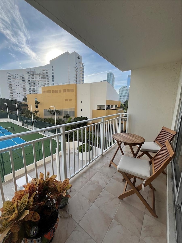 balcony featuring a view of city