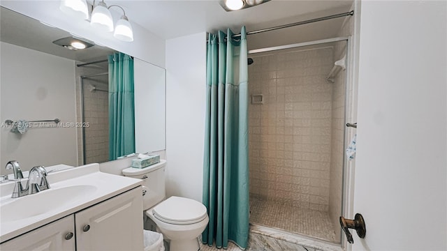 bathroom with a shower with curtain, toilet, and vanity