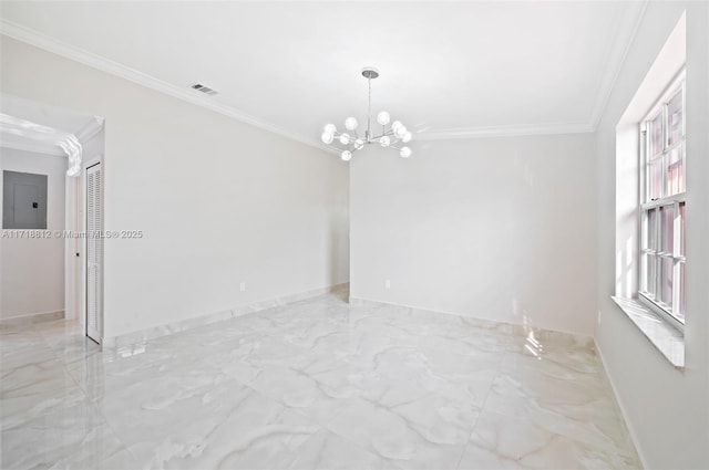 spare room featuring electric panel, a chandelier, and ornamental molding