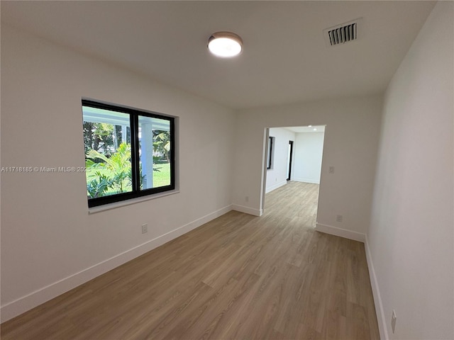 empty room with light wood-type flooring