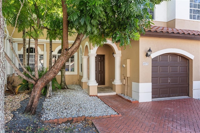 view of front of home with a garage