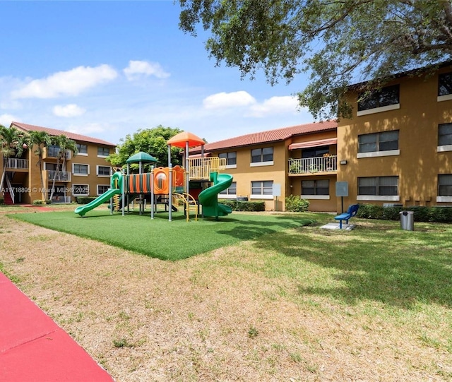 view of play area with a yard