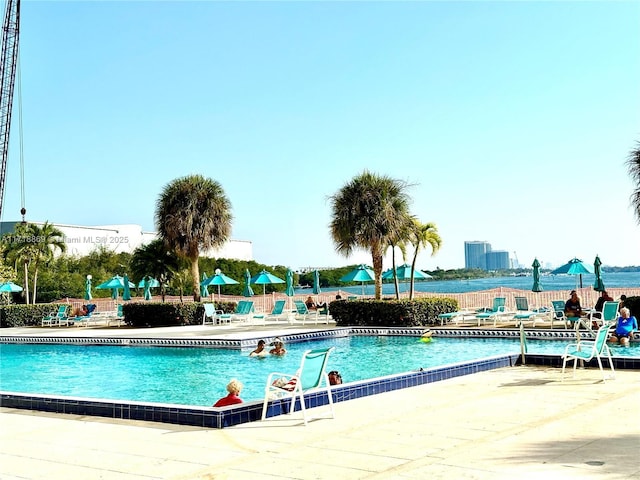 community pool with a patio