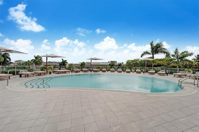 view of swimming pool featuring a patio