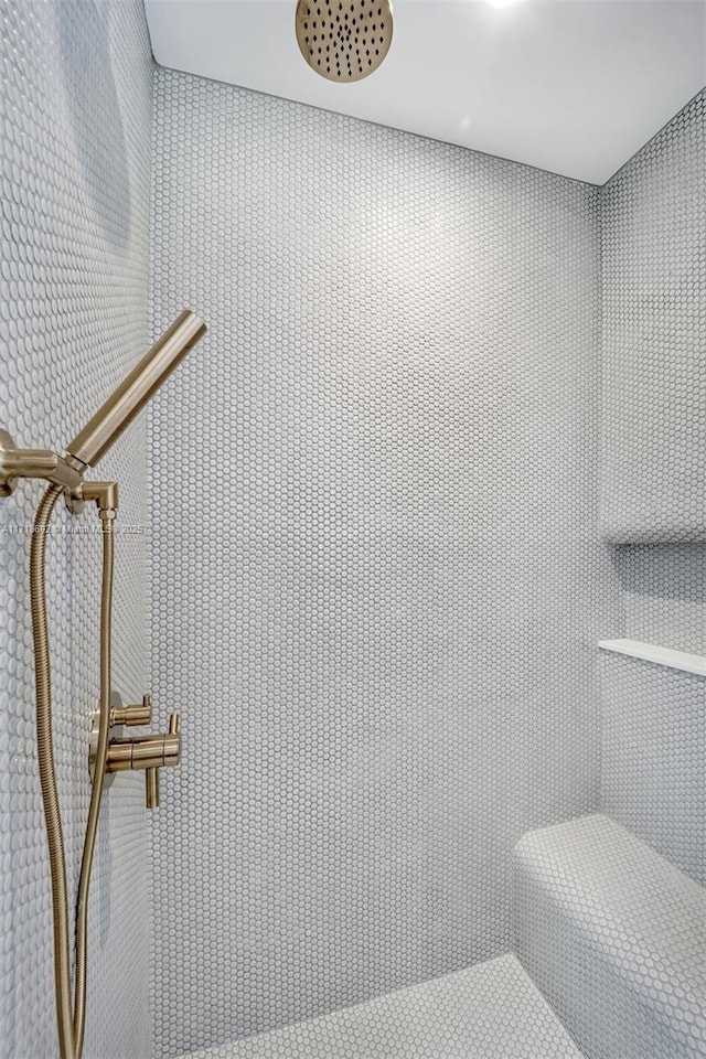 bathroom featuring a shower