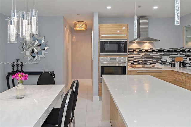 kitchen featuring light brown cabinetry, ventilation hood, backsplash, light tile patterned floors, and black appliances