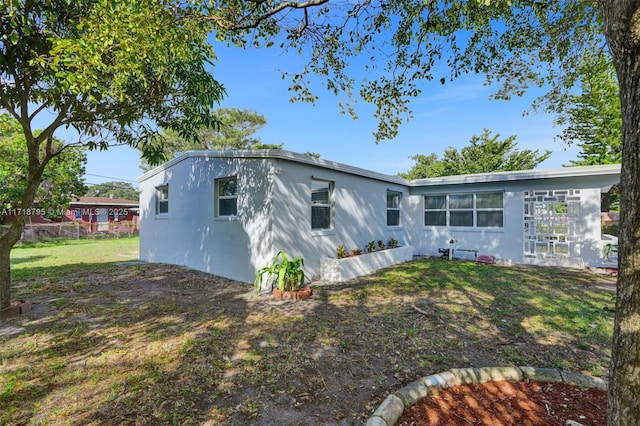 exterior space with a lawn