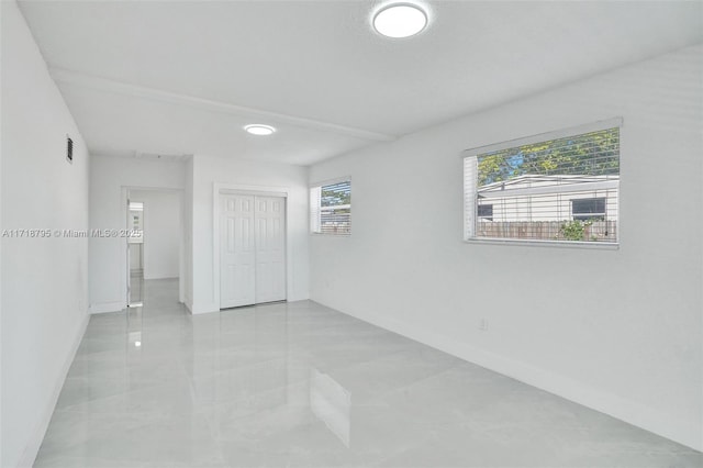 unfurnished bedroom featuring a closet