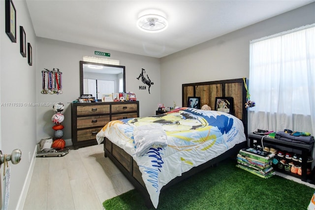 bedroom featuring hardwood / wood-style flooring