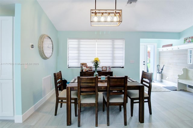 dining room with light hardwood / wood-style flooring