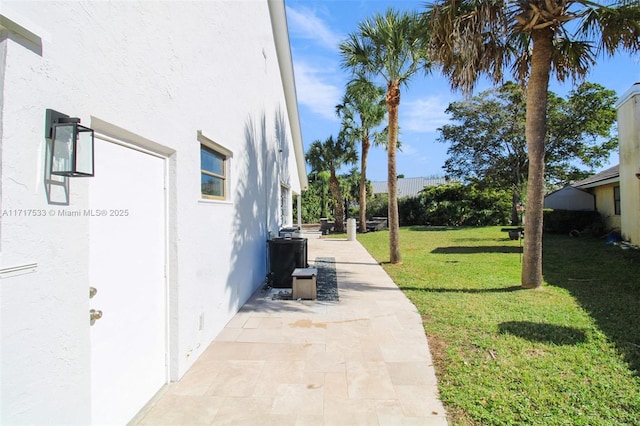 view of home's exterior featuring a yard