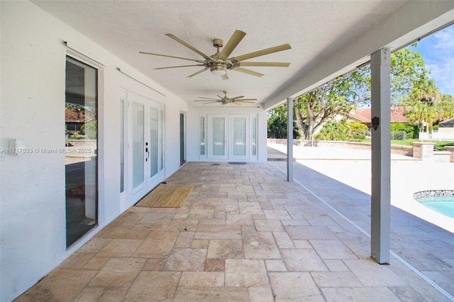 view of patio / terrace featuring french doors and ceiling fan