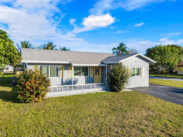 ranch-style house with a front yard