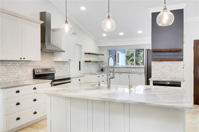 kitchen with open shelves, appliances with stainless steel finishes, crown molding, wall chimney range hood, and vaulted ceiling