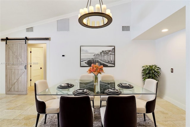 dining space with visible vents, lofted ceiling, crown molding, and a barn door