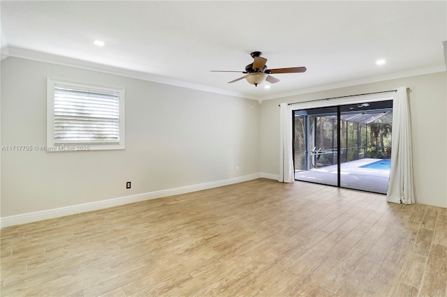 empty room with a ceiling fan, light wood-style floors, and ornamental molding