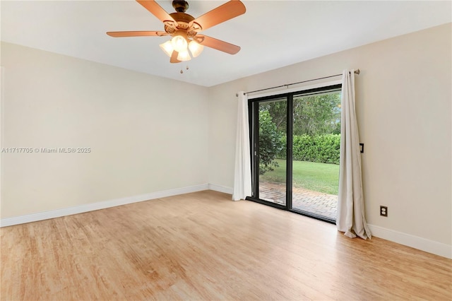 empty room featuring light wood-style flooring, baseboards, and ceiling fan